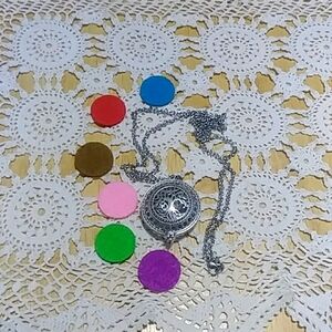 Aromatherapy necklace pendant  with chain and pads for essential oils